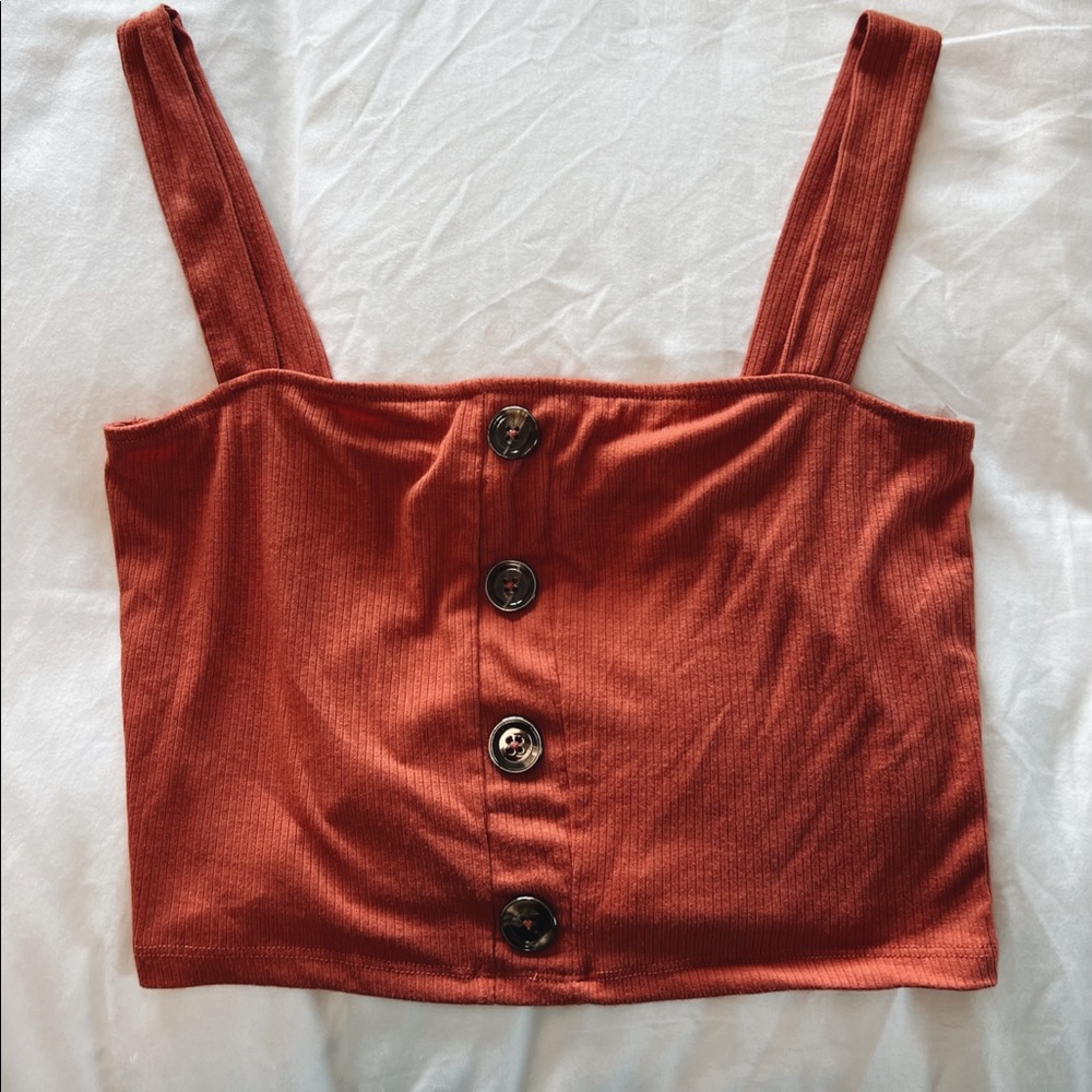 Orange cropped tank top.